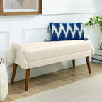Banc moderne avec coussin moelleux, accoudoirs géométriques et pieds en bois massifIdéal pour les salons, les chambres et les entrées