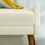 Banc moderne avec coussin moelleux, accoudoirs géométriques et pieds en bois massifIdéal pour les salons, les chambres et les entrées